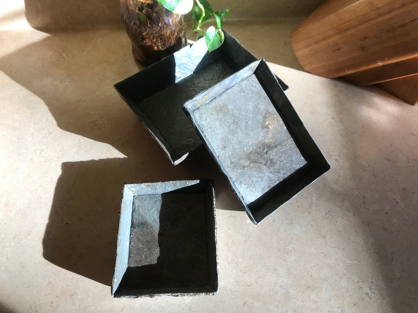 Small trays, clear masonry sealer finish, 1 1/2” high sides with various base sizes